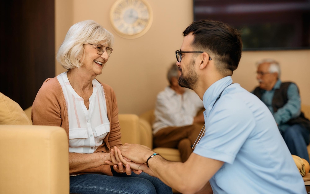 Person Talking With Their Elderly Parent