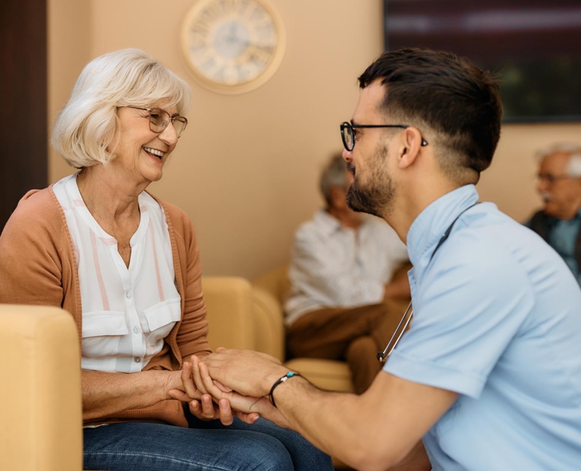 Person Talking With Their Elderly Parent