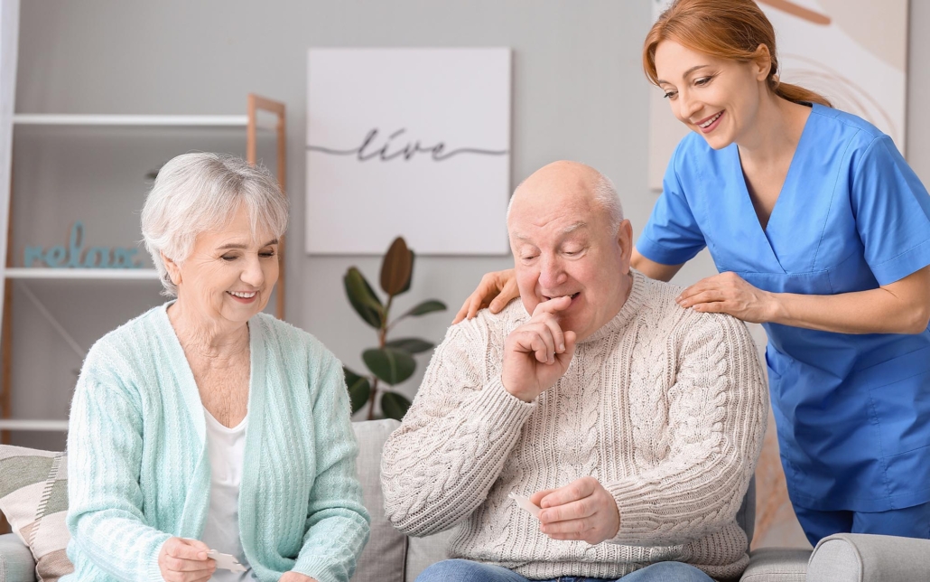 Caretaker Helping Older Couple With Memory Care