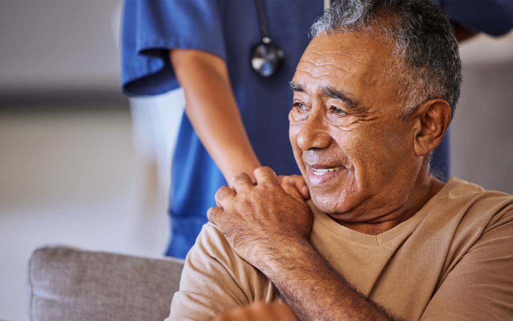 Nurse Or Doctor Give Man Support During Recovery Or Loss