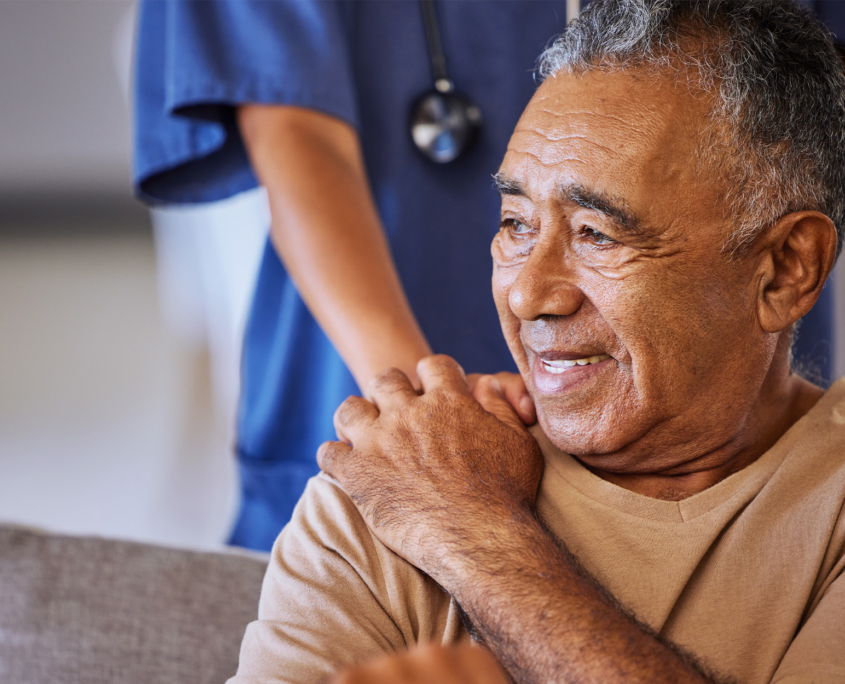 Nurse Or Doctor Give Man Support During Recovery Or Loss