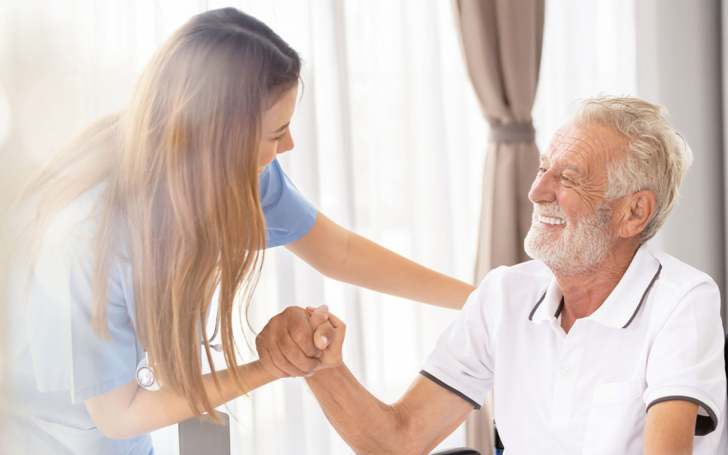 Man Being Cared For By A Private Nurse At Home