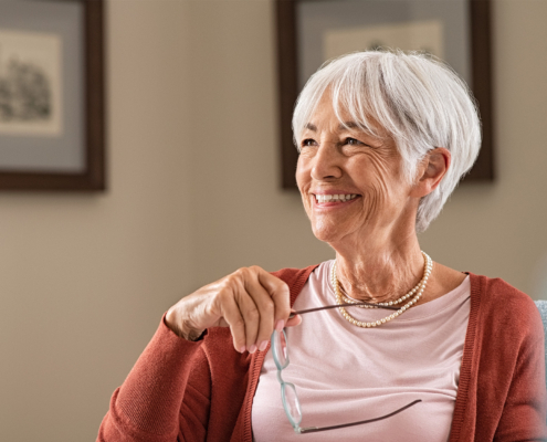 Happy Senior Woman Smiling At Home